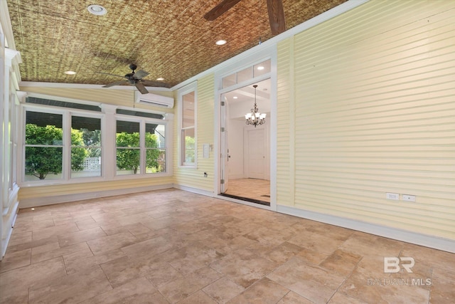 251 S Georgia Ave, Mobile, AL 36604 - unfurnished sunroom featuring a wall mounted AC and an inviting chandelier