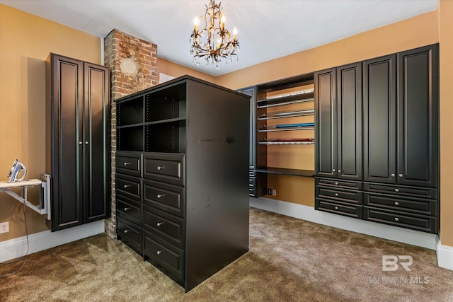 251 S Georgia Ave, Mobile, AL 36604 - spacious closet with carpet floors and a chandelier