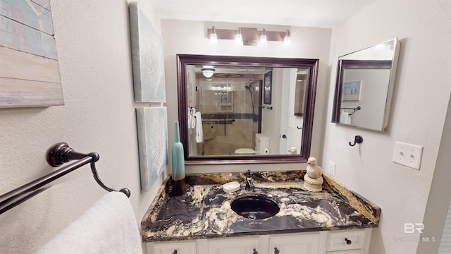 511 E Beach Blvd Unit 503, Gulf Shores, AL 36542 - full bath with a stall shower, toilet, and vanity