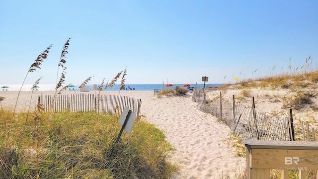 511 E Beach Blvd Unit 503, Gulf Shores, AL 36542 - water view featuring local beach and fence