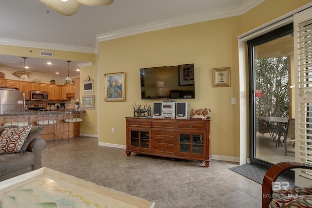 living room with light tile patterned floors, visible vents, baseboards, and ornamental molding