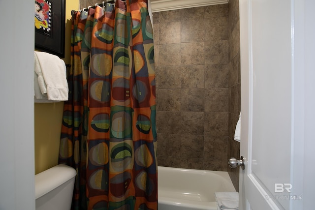 bathroom with toilet and shower / bath combo with shower curtain