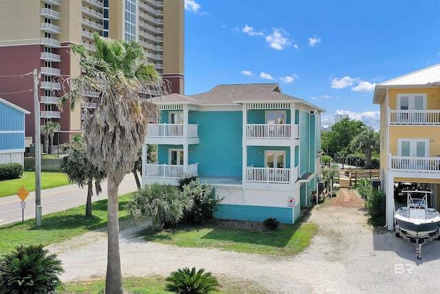 201 W 13th St Unit 2 B, Gulf Shores, AL 36542 - view of property featuring driveway