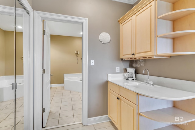 201 W 13th St Unit 2 B, Gulf Shores, AL 36542 - full bathroom with a bath, tile patterned floors, vanity, and baseboards