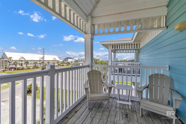 201 W 13th St Unit 2 B, Gulf Shores, AL 36542 - deck featuring a residential view