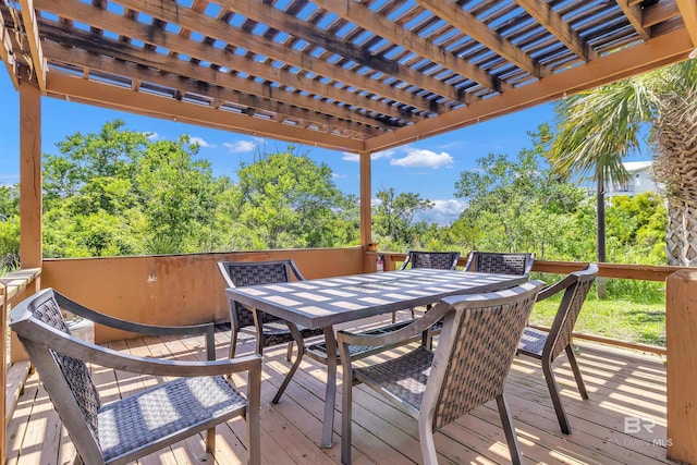 201 W 13th St Unit 2 B, Gulf Shores, AL 36542 - deck featuring outdoor dining space and a pergola