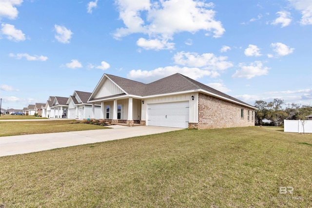 view of front of property featuring an attached garage, brick siding, driveway, board and batten siding, and a front yard