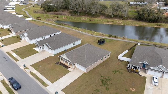 aerial view featuring a water view and a residential view