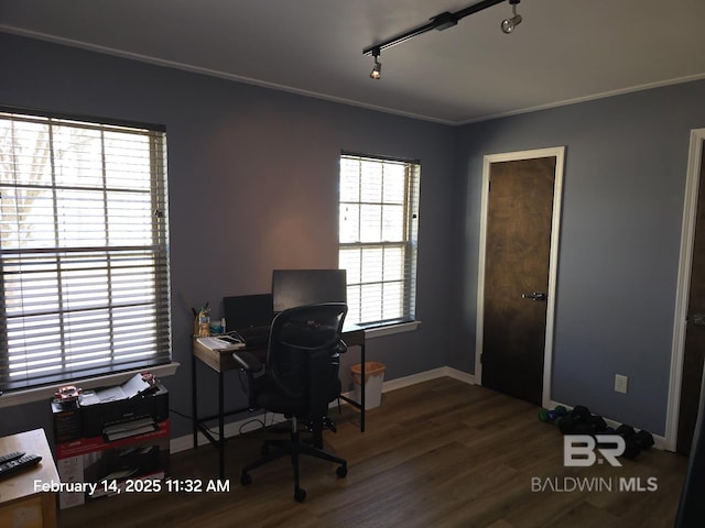 office space with crown molding, wood-type flooring, and rail lighting