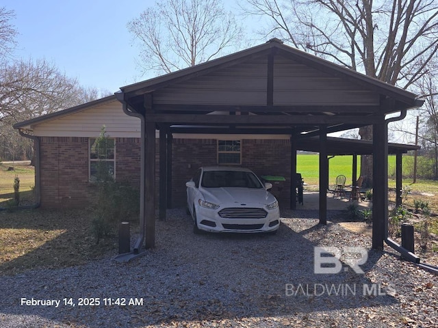 view of vehicle parking with a carport