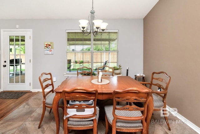 10234 Scott Plantation Dr, Mobile, AL 36695 - dining room featuring a chandelier and baseboards