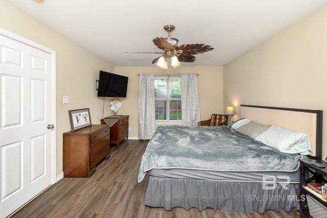 10234 Scott Plantation Dr, Mobile, AL 36695 - bedroom with wood finished floors and a ceiling fan