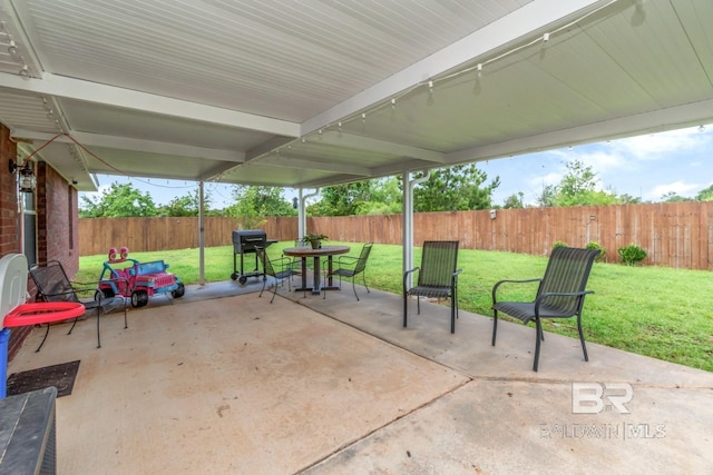 10234 Scott Plantation Dr, Mobile, AL 36695 - fenced backyard featuring a patio and outdoor dining space