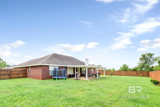 10234 Scott Plantation Dr, Mobile, AL 36695 - fenced backyard with a trampoline and a patio area