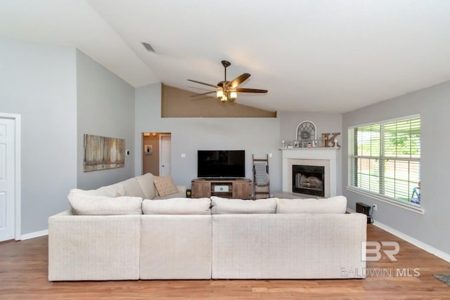 10234 Scott Plantation Dr, Mobile, AL 36695 - living room with a ceiling fan, a fireplace, wood finished floors, and lofted ceiling