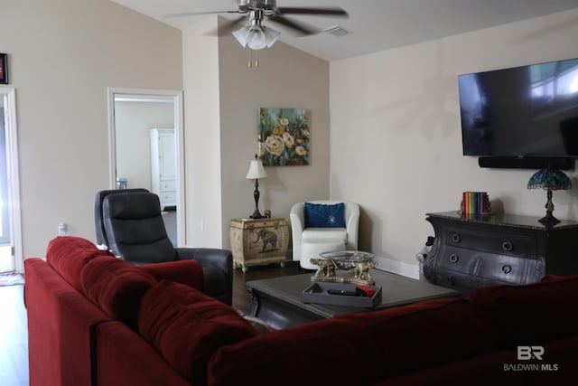 living room featuring visible vents, a ceiling fan, and wood finished floors