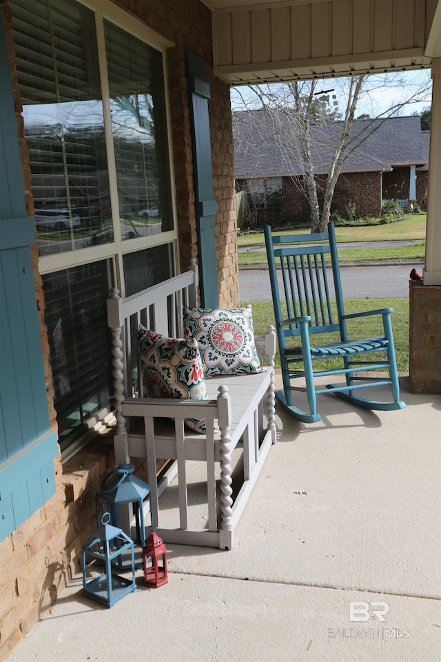 view of patio featuring a porch