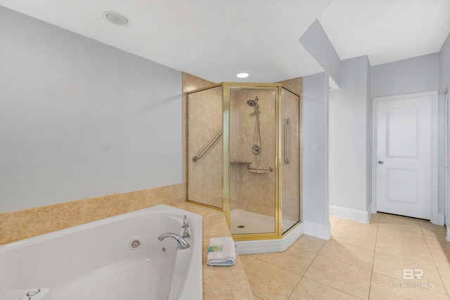 bathroom featuring separate shower and tub and tile patterned flooring