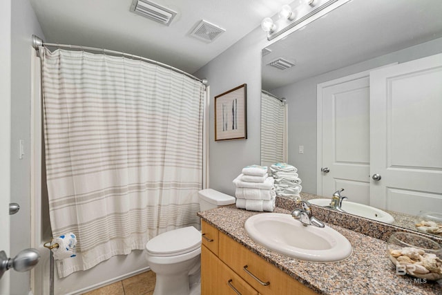 full bathroom featuring shower / bathtub combination with curtain, vanity, toilet, and tile patterned floors