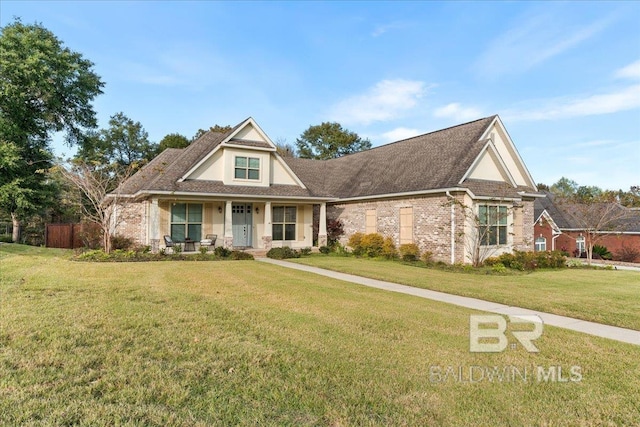 craftsman-style house with a front lawn