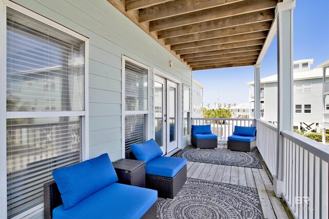 balcony featuring french doors