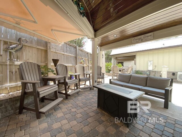 view of patio / terrace featuring ceiling fan, fence, and area for grilling