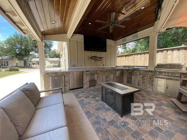 view of patio / terrace with fence and outdoor dining area