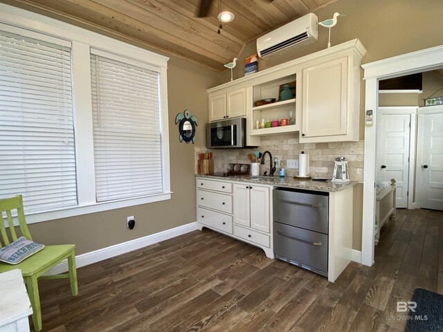 unfurnished office featuring a sink, vaulted ceiling, light wood-style floors, ceiling fan, and wooden ceiling