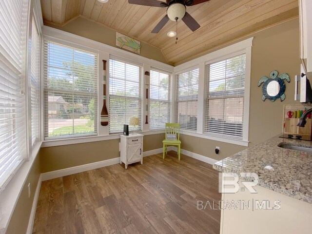 bedroom with wooden ceiling, lofted ceiling, and a wall mounted air conditioner