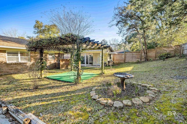 view of yard featuring a patio area and a fenced backyard