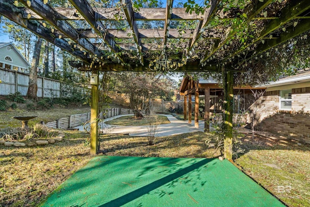 exterior space featuring a patio area, a fenced backyard, and a pergola