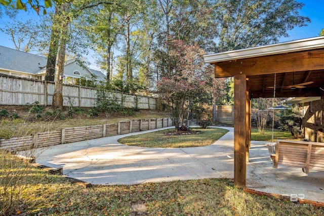 view of yard featuring a fenced backyard and a patio