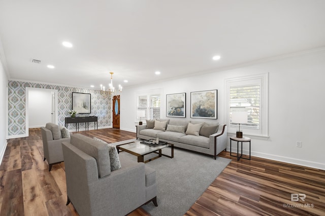 living area featuring baseboards, ornamental molding, visible vents, and wallpapered walls