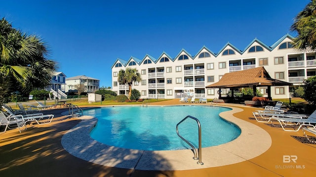 view of pool featuring a gazebo and a patio