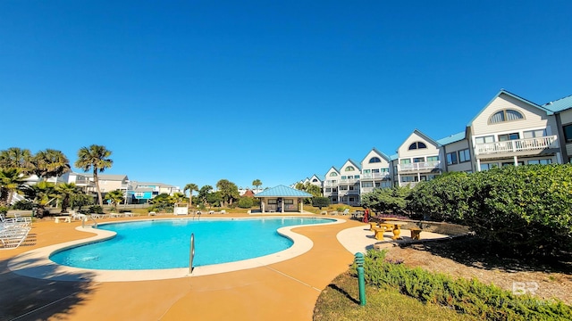 view of swimming pool with a gazebo and a patio