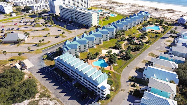 aerial view featuring a view of the beach and a water view