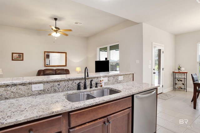 21105 Zinfandel Ln, Silverhill, AL 36576 - kitchen featuring a ceiling fan, light stone countertops, visible vents, stainless steel dishwasher, and a sink