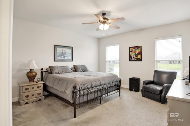 21105 Zinfandel Ln, Silverhill, AL 36576 - bedroom featuring baseboards, a ceiling fan, and light carpet