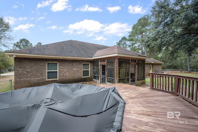 deck featuring a sunroom