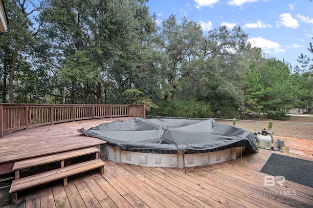 deck with a hot tub