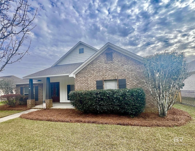 10340 Gayfer Road Ext, Fairhope, AL 36532 - view of front of property featuring a front yard, fence, and brick siding