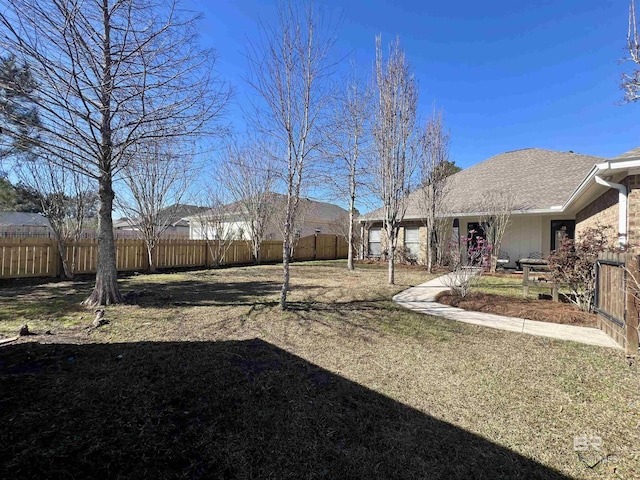 view of yard with fence