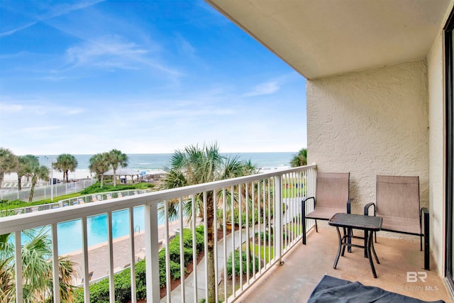 balcony featuring a water view