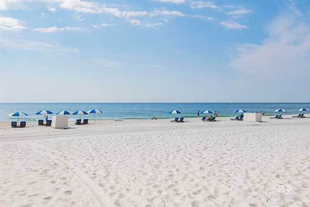 view of water feature with a beach view