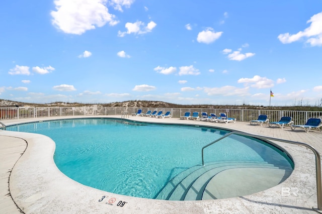 view of pool featuring a patio area