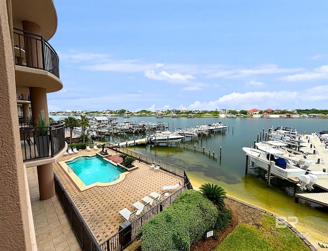 29235 Perdido Beach Blvd Unit 203, Orange Beach, AL 36561 - view of swimming pool featuring a water view, a dock, and view of marina