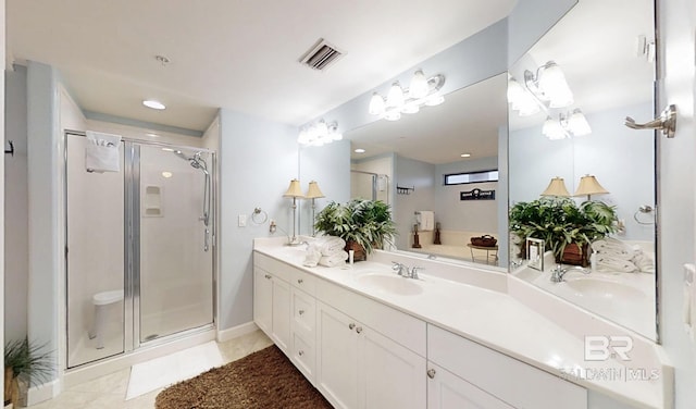 29235 Perdido Beach Blvd Unit 203, Orange Beach, AL 36561 - full bath with double vanity, a shower stall, and tile patterned flooring
