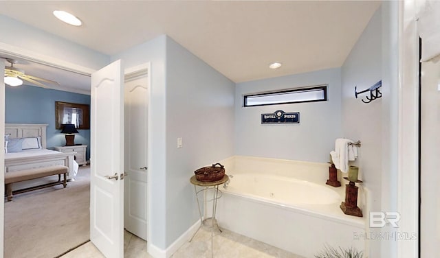 29235 Perdido Beach Blvd Unit 203, Orange Beach, AL 36561 - bathroom featuring a jetted tub and a ceiling fan