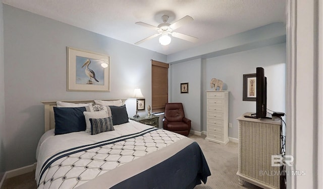 29235 Perdido Beach Blvd Unit 203, Orange Beach, AL 36561 - bedroom with light carpet and ceiling fan