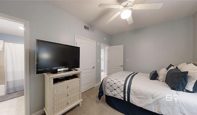 29235 Perdido Beach Blvd Unit 203, Orange Beach, AL 36561 - bedroom with light colored carpet and a ceiling fan